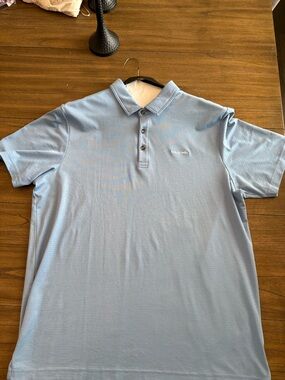 TravisMathew Light Blue Short Sleeve Polo